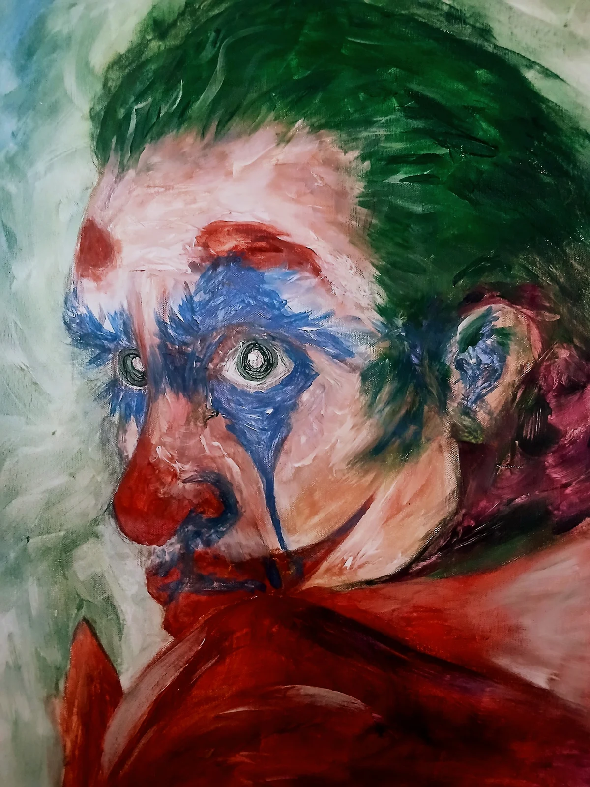 Joker, Ekspresivan portret snažnog emocionalnog naboja, u kojem se intenzivni zeleni, crveni i plavi tonovi isprepliću s naglašenim potezima kista. Djelo spaja figurativno slikarstvo s elementima psihološkog ekspresionizma, stvarajući upečatljiv vizualni dojam.
Idealno za: Moderne, industrijske, alternativne i umjetnički uređene interijere, kreativne studije, galerijske prostore i ljubitelje nekonvencionalne umjetnosti.